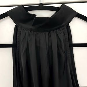 Like new. Black satin halter top